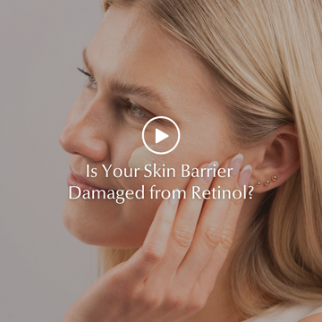 Close-up of woman gently touching glowing healthy skin — symbolising skin barrier repair after retinol use