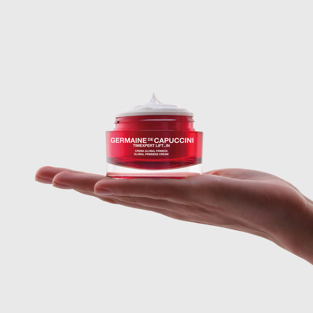 T Lift_IN Global Firming Cream jar in model's hands, best anti-ageing cream 