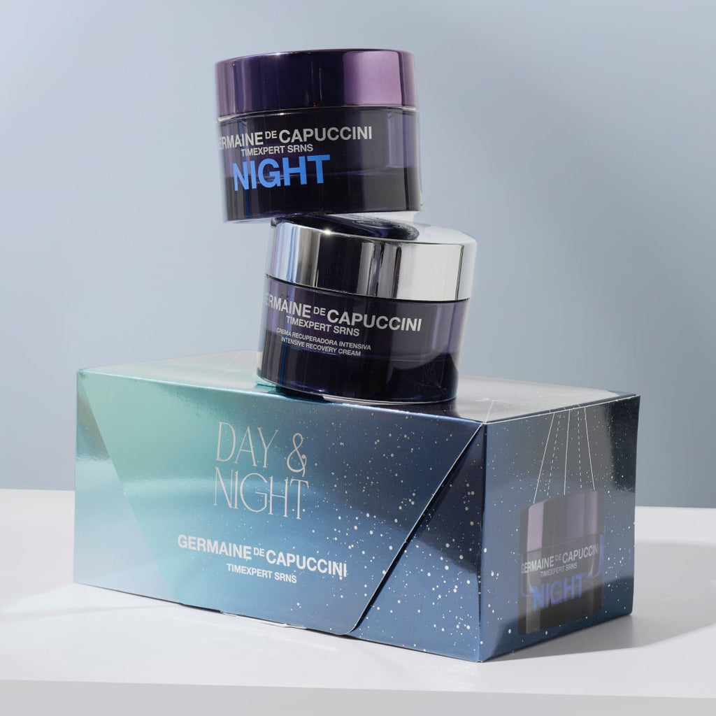 Two jars of Germaine de Capuccini Day & Night cream on a white surface with a light gray background.